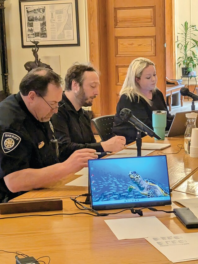 Undersheriff Greg Demo, Finance Director Joe Allaire, and HR Director Chanda Johnson address ongoing staffing challenges at the sheriff’s office, namely the six unfilled dispatcher positions.