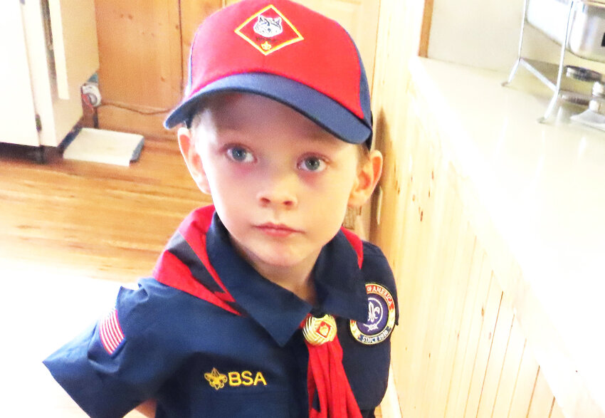 Cub Scout Jude Aron helped serve his community at a pancake breakfast.