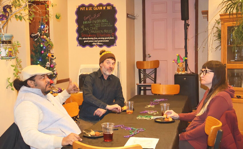 Discussing strategyVice President Nick Goines (left); Treasurer Judd Kaufman (center); and Chelsea LaForge (right) engage in conversation about the Chamber’s future initiatives and goals.