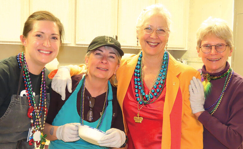 Kitchen geniesAmong those cooking and serving the Mardi Gras food were, from left, Rebecca Mathews, Norma Cassin, Cindy Berginc and Suzy Schemel.