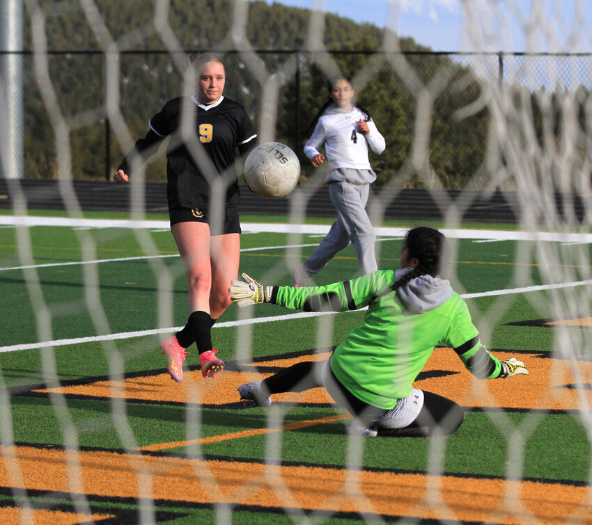 Goal!Adele Fisher scoring one of her two goals against Union Colony.