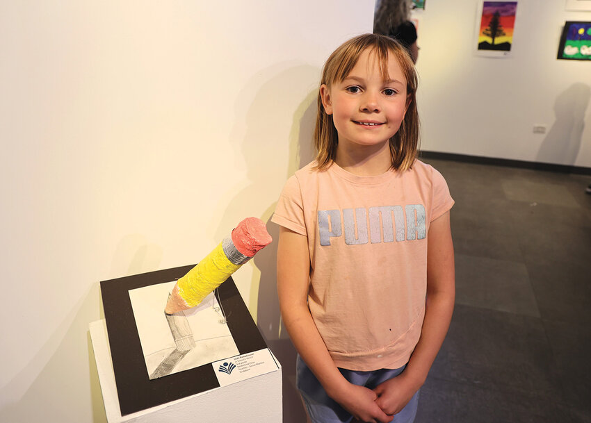 A School's PencilNederland Elementary third grader Lilah Pietrykowski enthusiastically shows off her art.&nbsp;