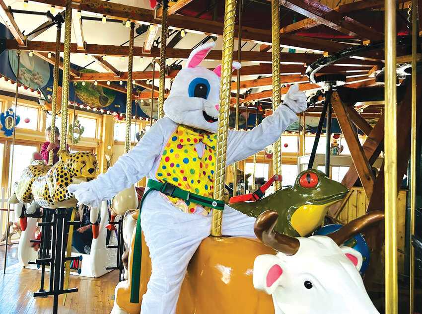 Joy undelayedThe Easter bunny had to take a short break from egg hiding and ride the Carousel of Happiness.