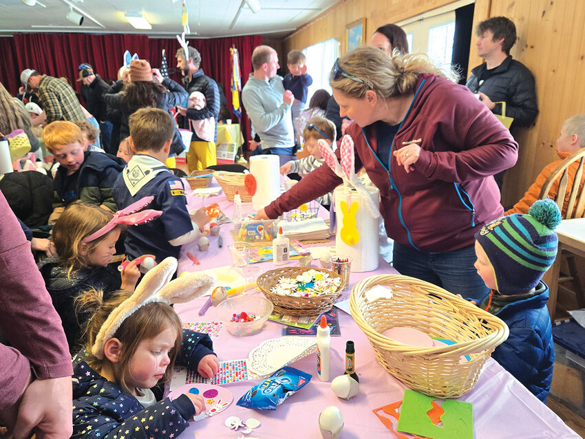 Young artistsFamilies make Easter arts and crafts in the Coal Creek Canyon community center.