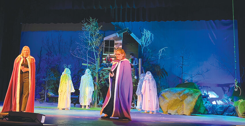 The narratorsNarrators Jiselle Osteboe (left) and Maddie Lane (right) provide intrigue throughout the performance.
