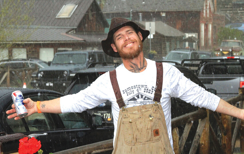 An unfazed mountain residentRain, graupel, great food, great music, and a Pabst Blue Ribbon. What more could a person ask for?
