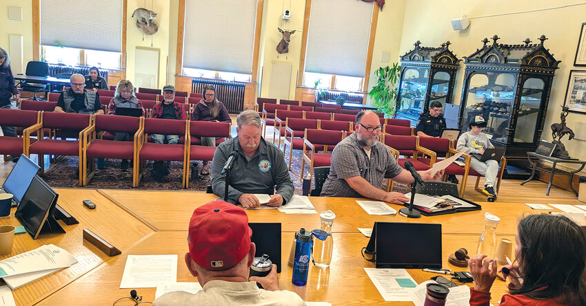 County road discussionJohn Combs and Andrew Decker present information to the BoCC on June 5.