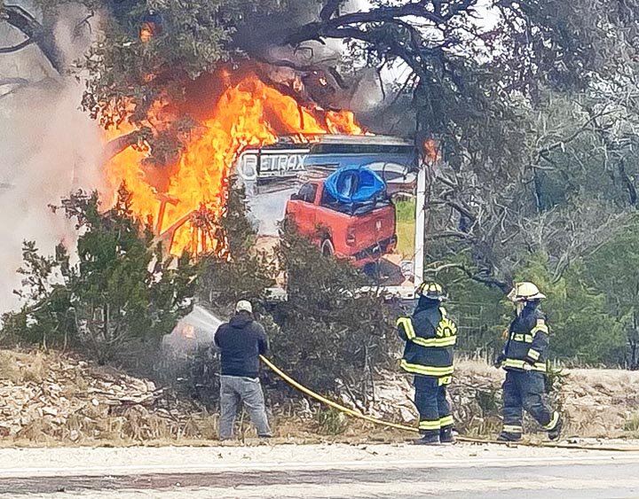 FIERY CRASH – Firefighters battle a blaze that started after a 2017 Ford delivery truck crashed into a tree some six miles east of Eldorado on U.S. 290 on Thursday morning, February 29th. Jacob Daniel Aguayo, 30, died in the crash. He was pronounced dead at the scene by Schleicher County Justice of the Peace Rahegyn Franke. --  KATHY MANKIN | THE ELDORADO SUCCESS