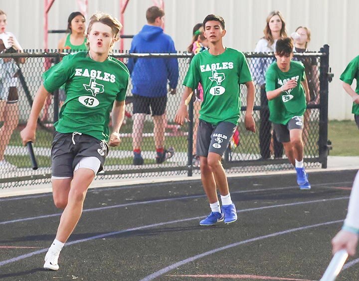 TURBO CHARGED -- Cash Umphress sprints away from the hand-off zone after getting the baton from Dominick Garcia during the 8th grade boys 4x200 Meter Relay on Thursday, March 21st in Sterling City. The team, including Umphress, Garcia, Cole Meador and Ryder Walker placed first in the event with a time of 1:44.7 57. -- .MANDI UMPHRESS | THE ELDORADO SUCCESS