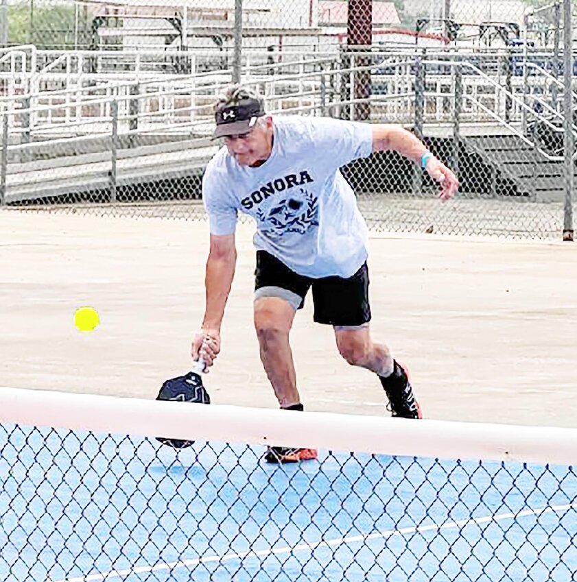PICKLEBALLER
Virgil Burge hustles after the ball during the first annual pickleball tournament, held to benefit Eaton Hill Nature Center. COURTESY PHOTO