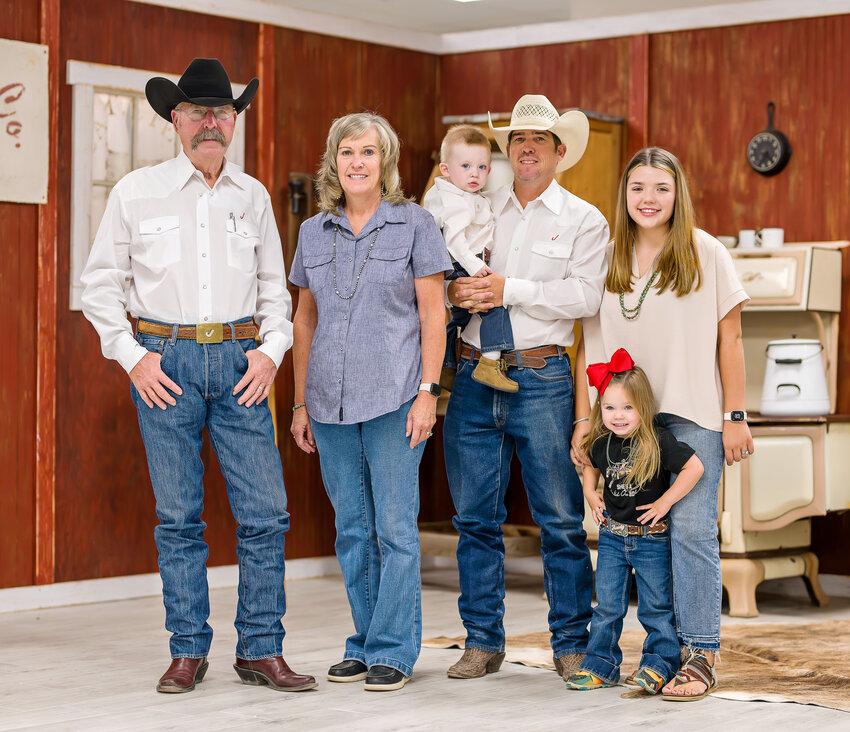 Johnny and Amy Ferguson (left) with their son Josh, holding his son JJ, alongside his wife Ashley and their daughter Harley, inside the J&J Cattle Co. Mercantile located at 102 N Plaza Avenue. The new meat market, located in Big Lake, will have its grand opening this Friday, offering a variety of locally sourced beef products and more.