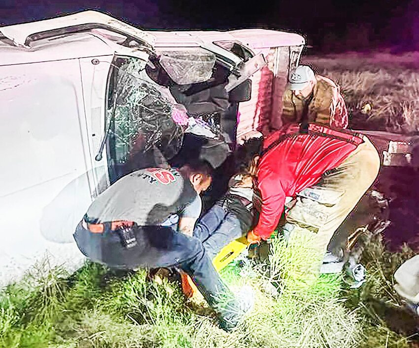 TEAMWORK
Emergency crews responded to a one-vehicle accident on Miers Road early Tuesday morning. About four miles out, a 51-year-old female was traveling southbound toward Sonora. According to law enforcement, the driver left the roadway and was thrown into a skid, hitting the east side of the roadway rolling into the pasture. The driver was trapped in the vehicle and had to be freed by the Sonora Volunteer Fire Department. PHOTO COURTESY OF SCSO