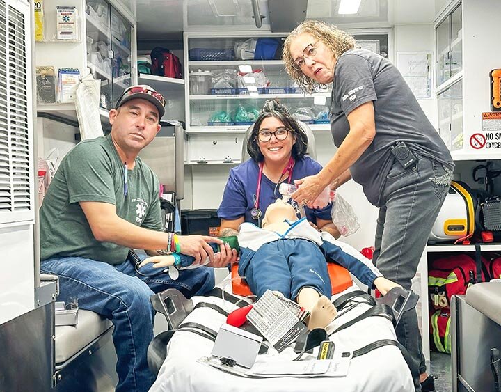 TWO GENERATIONS OF CARING -- For the first time in its history, a mother and her children are certified emergency medical technicians (EMTs). Pictured above, Jennie Rendon and her children, Jasen Escarcega and Brittany Arispe as they train inside an EMS ambulance. -- COURTESY PHOTO | TAMMY CRISWELL