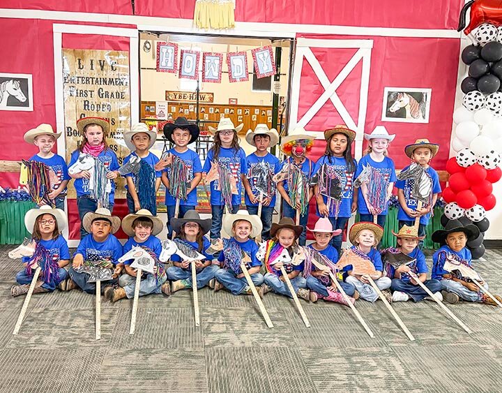 HOWDY, PARDNER! -- Eldorado first graders posed with their stick horses following the grand finale of the 39th annual First Grade Rodeo on Friday, March 7th. -- KATHY MANKIN | THE ELDORADO SUCCESS