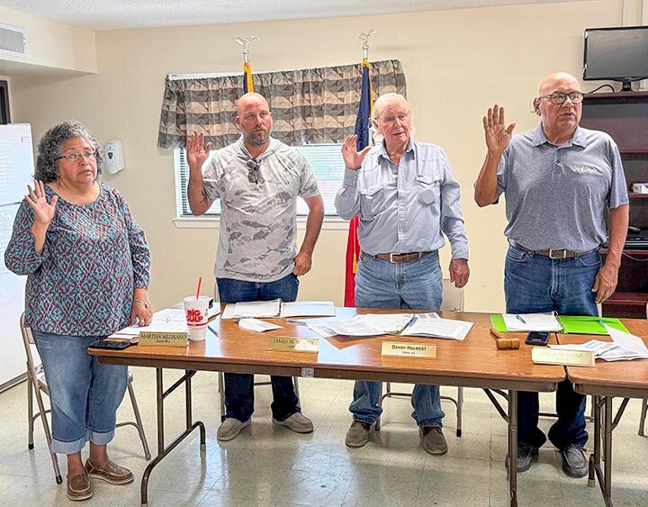 STARTING A NEW TERM -- Eldorado city council  (L-R) Martha Medrano, Michael Ballew, Danny Halbert and Mayor Oscar Martinez took the oath of office Monday evening for a new two-year term. -- KATHY MANKIN | THE ELDORADO SUCCESS