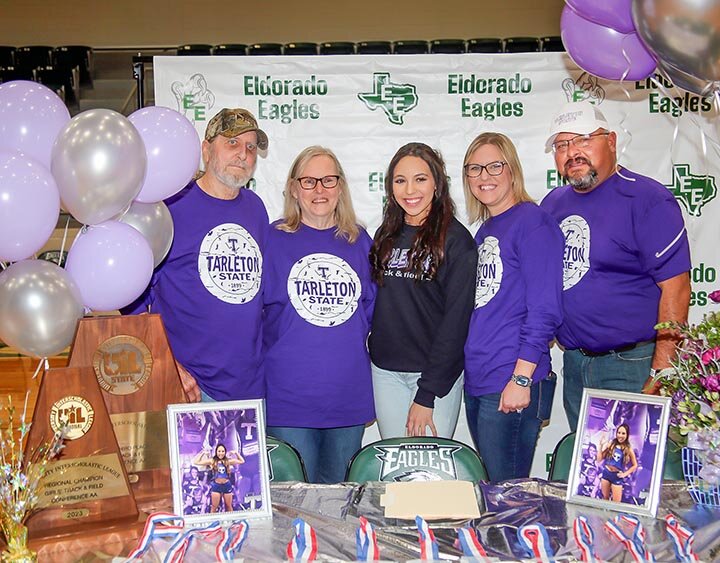 RUNNING TO TARLETON STATE! EHS senior Logan Prater (center) was joined (L-R) by her grandparents Mike and Shelia Prater, and parents Kristina Prater and Luiz Martinez as she signed her national letter of intent on Wednesday, November 8th, indicating her commitment to run track at Tarleton State University in Stephenville. -- KATHY MANKIN | THE ELDORADO SUCCESS