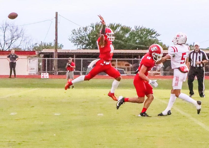 LEAPING BRONCO 
Senior wide receiver, Kam Aguero, makes a flying leap in efforts of blocking the pass from the Miles quarterback. The Broncos fell to the Miles Bulldogs in their home opener 32-14 on Friday, August 30, 2024. The Broncos will be on the road this week to take on the Johnson City Eagles.
ANGIE BRYANT | THE DEVIL’S RIVER NEWS