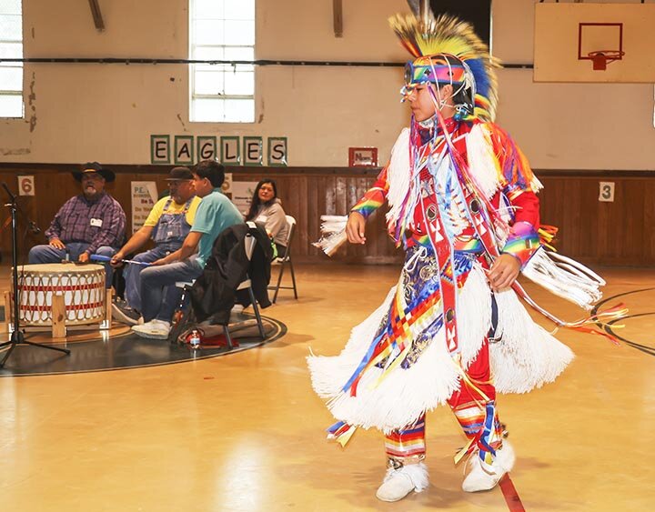 COMANCHE NATION JUNIOR PRINCESS -- Martin Marciano introduces Comanche Nation Junior Princess Arlene Schonchin to Eldorado Elementary students on Friday, November 8th as the Comanche Nation Youth Dancers performed in the elementary gymnasium. -- KATHY MANKIN | THE ELDORADO SUCCESS