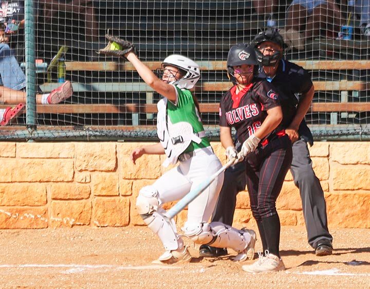 SNAGGING A HIGH ONE -- Lady Eagles catcher Allison Meador saved a run as she prevented this high pitch from going to the backstop during Tuesday evening’s game with Colorado City. The Lady Eagles took a tough loss as the Lady Wolves jumped ahead early and stayed there to take the 17-1 victory. -- KATHY MANKIN | THE ELDORADO SUCCESS