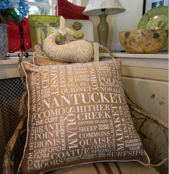 A Nantucket signature pillow and whale available in six colors at LLN and Marine Home Center exclusively.