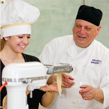 Sarah Clunie makes homemade pasta during culinary- arts class with teacher Bob Buccino.