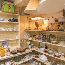 The gift room displays china, lamps and artwork near the front of the shop.