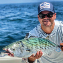 Sean Bassman with a big bonito he caught east of the island.