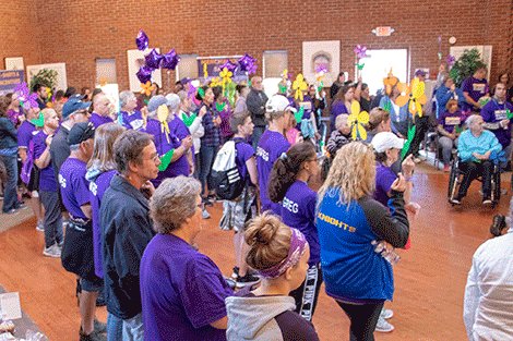Participants take part in the opening ceremony of the Walk to End Alzheimer's in Canton.