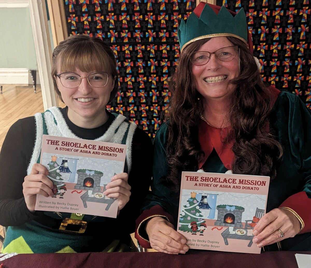 Becky Duprey, on the right, of Ogdensburg, recently published a children’s Christmas book. She is pictured with Hallie Boyer, illustrator of the book. Submitted Photo.