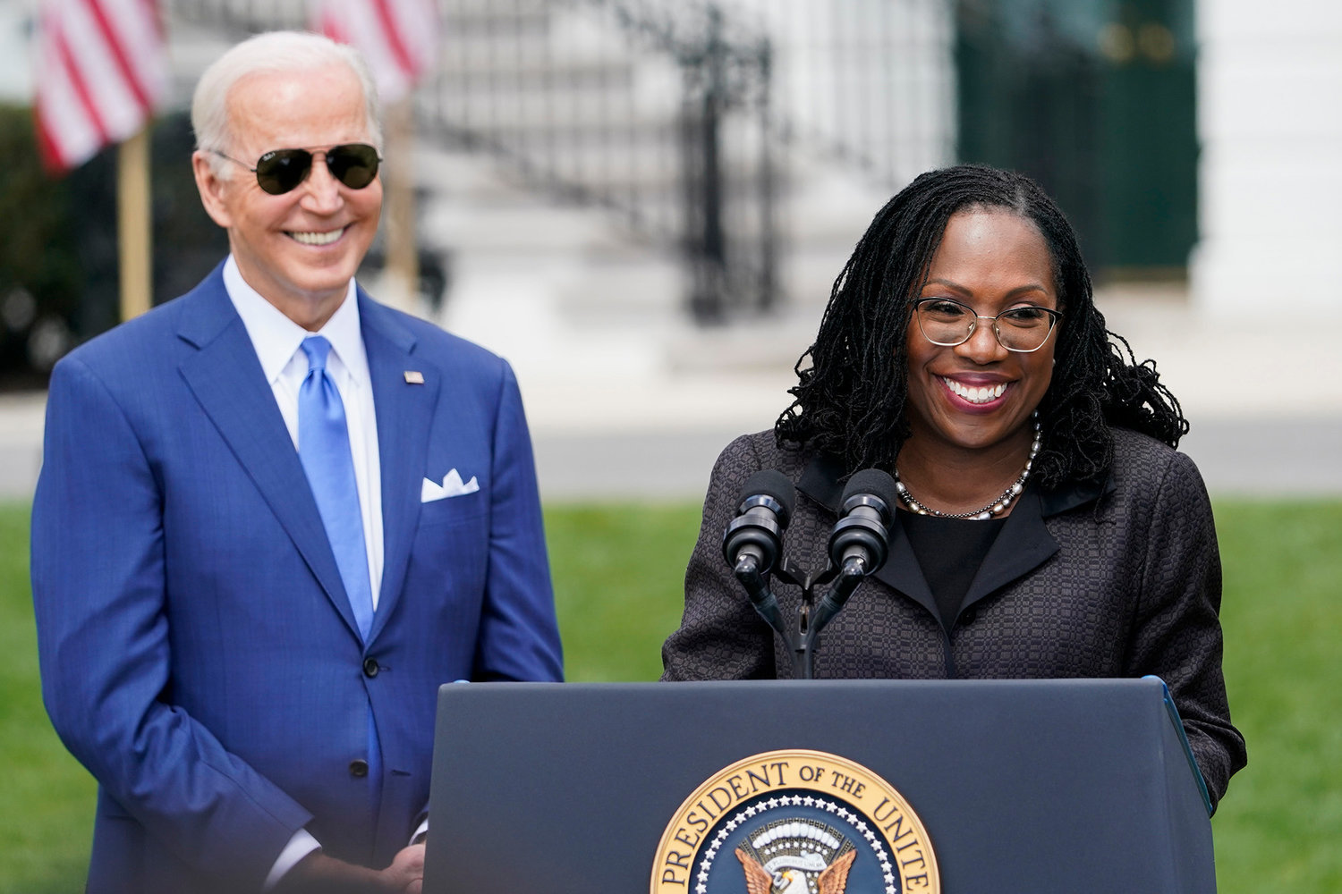 FILE - President Joe Biden listens as Judge Ketanji Brown Jackson speaks during an event on the South Lawn of the White House in Washington, April 8, 2022, celebrating the confirmation of Jackson as the first Black woman to reach the Supreme Court. Overall, 48% of Americans say they approve and 19% disapprove of Jackson’s confirmation to the high court according to the new poll from The Associated Press-NORC Center for Public Affairs Research. The remaining 32% of Americans hold no opinion. (AP Photo/Andrew Harnik, File)