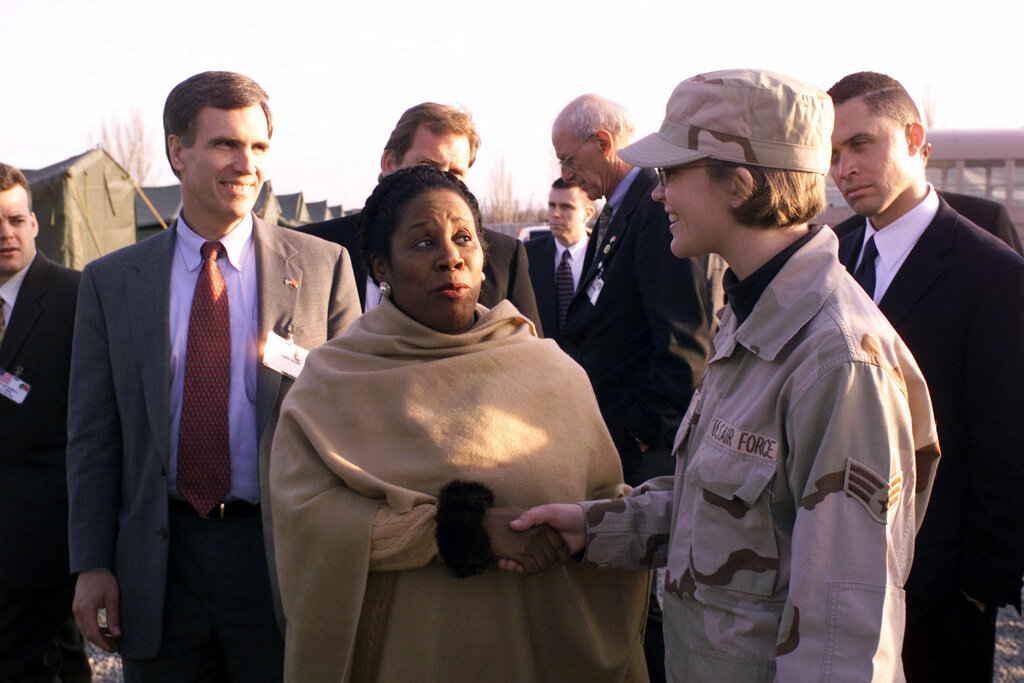 US Congresswoman, The Honorable Sheila Jackson Lee, Democrat (D) Texas (TX), shakes hands with US Air Force (USAF) Senior Airman (SRA) Heather Page, 376th Air Expeditionary Wing (AEW) Services Squadron, during a visit with other Congressional Delegates at Peter J. Ganci Jr. Air Base, Kyrgyzstan, in support of Operation ENDURING FREEDOM.