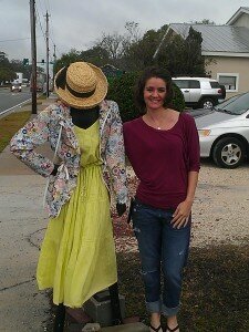Retail Therapy Co-owner Jessica stands beside manikan