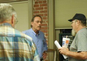 Cotner talks depot restoration with audience members.