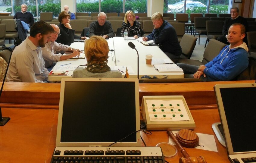 CRAAB Members begin deliberations.  Clockwise from center:  Marla McDaniel (back to camera); Chair Mike Zaffaroni, Vice Chair Andy Curtin; Arlene Filkoff; Lou Goldman; Commissioner Robin Lentz; Rick Daniel; Dan McCranie.  Audience members (l-r):  Lynn Williams, Eric Bartelt, John Stack