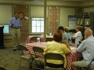 Architect John Cotner explains restoration of the historic train depot to a Museum audience.