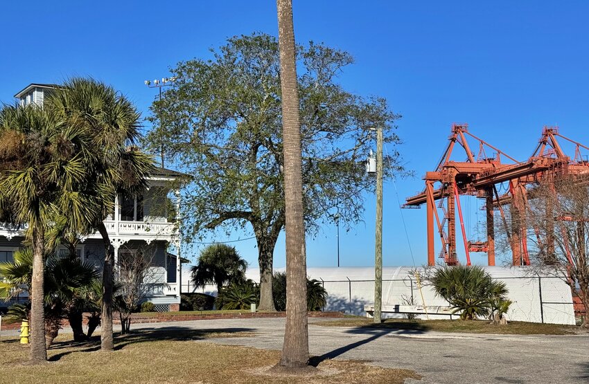 Fabric warehouse can be seen from historic neighborhood