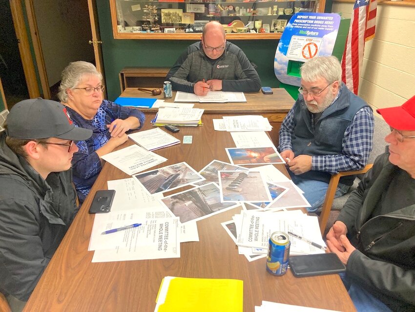 Village staff and trustees view the repairs needed at the wastewater treatment plant Monday Feb. 12. From left to right are Trustee Michael Eslinger, Clerk Sandi Isaacs, Village President Bob Geist, Trustee Dale Isaacs, and Streets and Utilities Head Bob LaMarche.