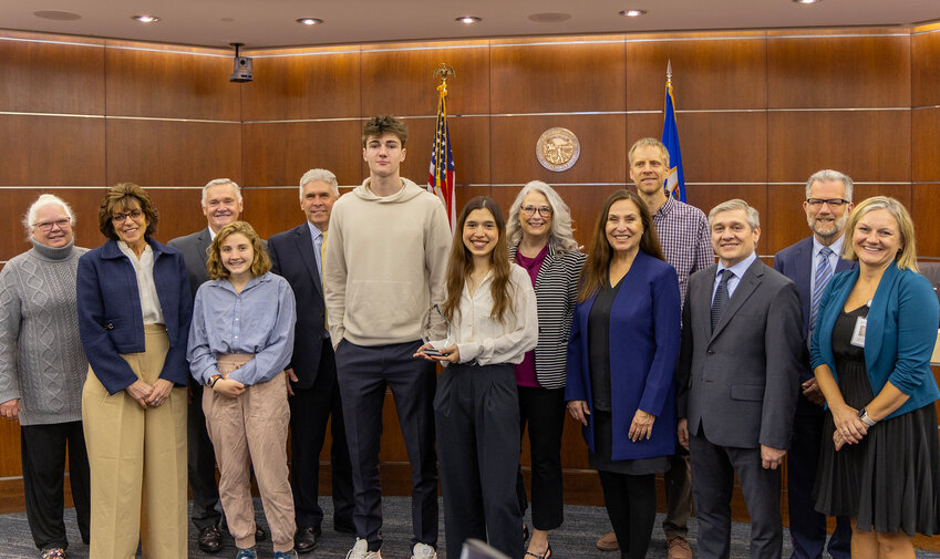 Student members of the Vape Waste Team, which won the 2024 Public Health Achievement Award for youth, are pictured with the Dakota County Board of Commissioners and county staff.