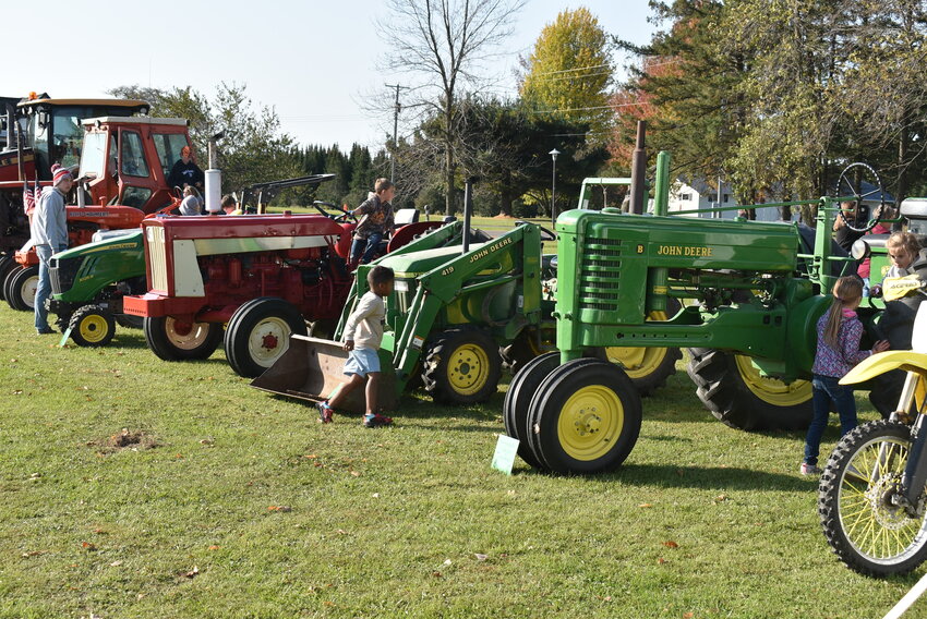 Students enjoyed climbing on a variety of tractors.