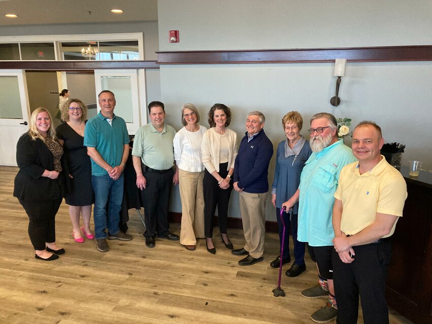 The group of Paul Harris Fellows honored at a recent dinner. Left to right Vicki Illa, Abby Meyers, Bryan Schowalter, Greg Kasel, Jane Scully, Janet Stotko, Mike Slavik, JoAnne Bollenbeck, Craig Mattson and Craig Beissel.The group of Paul Harris Fellows honored at a recent dinner. Left to right Vicki Illa, Abby Meyers, Bryan Schowalter, Greg Kasel, Jane Scully, Janet Stotko, Mike Slavik, JoAnne Bollenbeck, Craig Mattson and Craig Beissel.