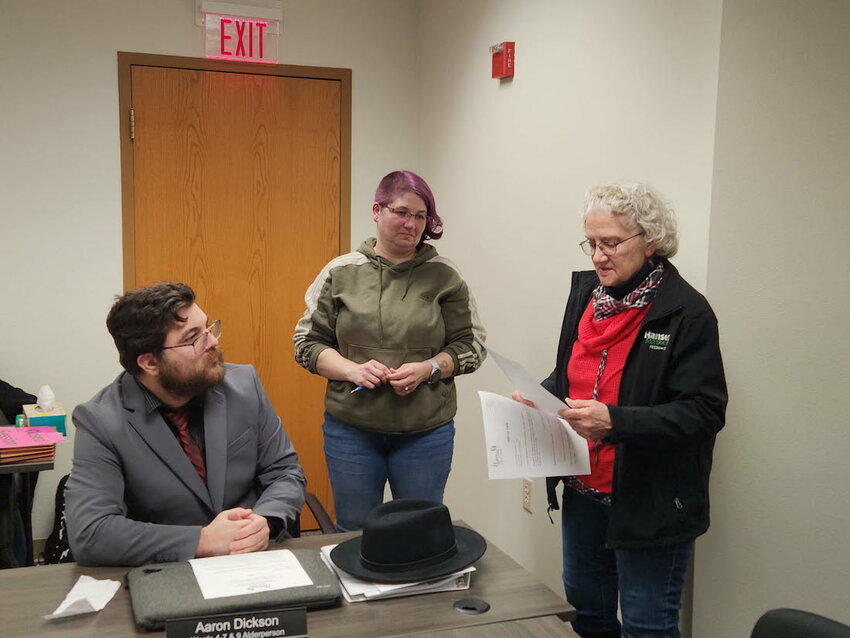 Stanley resident Terry Metzger (right) was officially sworn in as the Third Ward Alderperson during the April 7th City Council meeting. Metzger, who was appointed to the position by Mayor Mike Henke, took the oath of office as Alderperson Aaron Dickson (left) and City Administrator Nicole Pilgrim looked on.