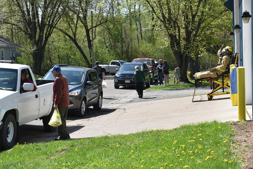 The street outside the fire hall was a busy place during the Owen-Withee-Curtiss Fire & EMS District Mother’s Day Chicken Dinner on May 11. They sold out early.