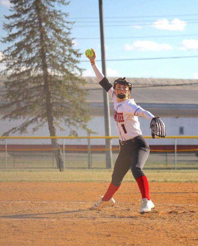Addie Hatlestad winds up to pitch at Mill Yard Park in Cornell Friday. 