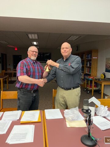 Paul Heggemeier receives recognition for 15 years of service on the school board.