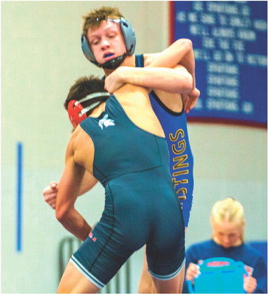 Taylon Little Soldier fought back from 10-2 to win 15-13 in overtime at the Simley dual. Photo by Bruce Karnick