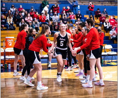 UWRF student-athlete Kameri Meredith is all smiles as she is introduced before a UW-River Falls women&rsquo;s basketball game in the WIAC tournament on Feb. 21 at UW-Eau Claire. Sam Silver photo.