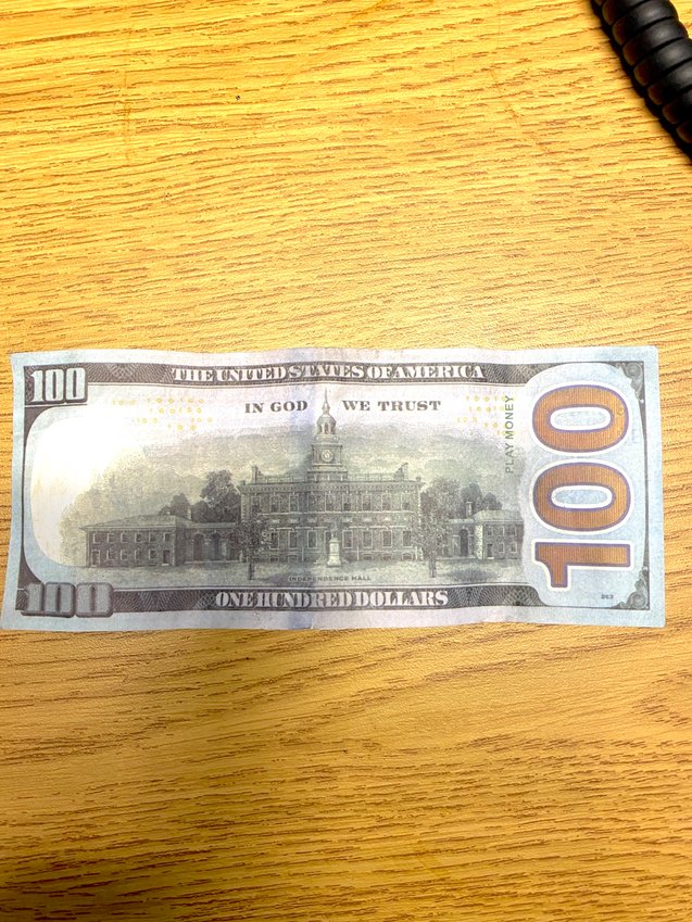 Reports of $100 bills with serial number LGO03229158 and marked &quot;play money&quot; (dashed oval) on the back have prompted an alert from the Chippewa County Sheriff's Department.