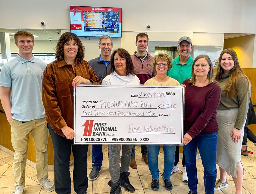 First National Bank of River Falls recently donated $2,500 toward the Prescott pickleball courts. Pictured are (back, from left): Shane Butler, Tom McQuaid, Chad Steger, Mike Volkman, Katie Pichla; (front, from left): Lisa Johnson, Pat Reuter, Kathy Hovel, Dar Hovel.
