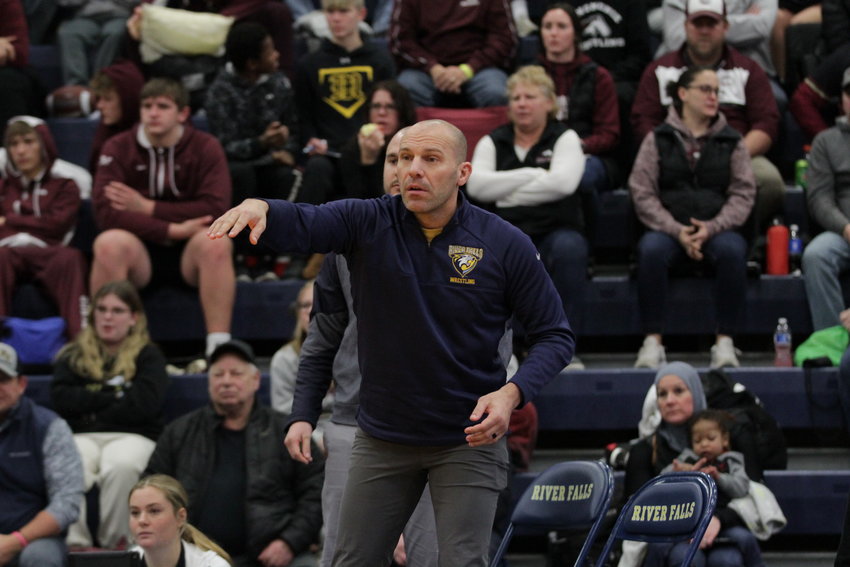 Kevin Black, formerly the head coach of the River Falls High School wrestling team coaches during the Northern Badger Wrestling Tournament in River Falls on Friday, Dec. 30. Black stepped down as River Falls head coach shortly after the 2022-23 season ended.