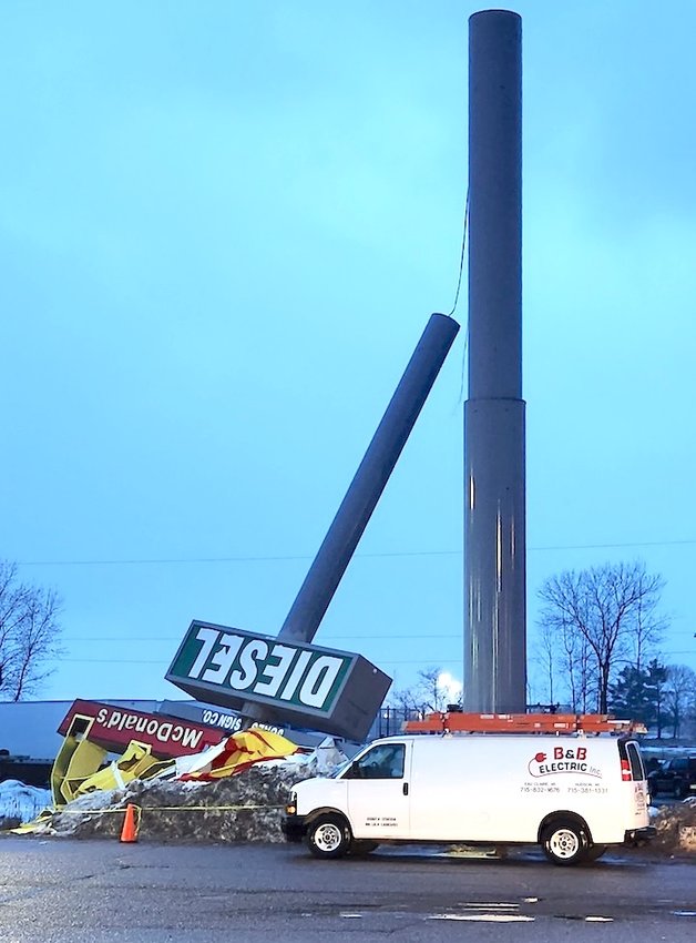 Located just east of where the tornado blew through in December 2021, the Travel Stop sign at 600 South Broadway came tumbling down in storm winds Friday, March 31.